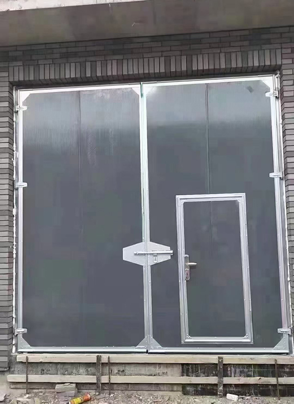 天祝工业平开门在大型设备制造车间的应用实例 天祝工业平开门在大型设备制造车间的应用实例